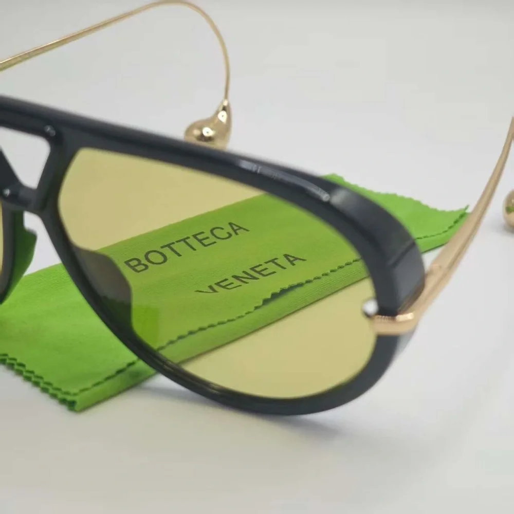 Bottega Veneta Black and Gold Sunglasses